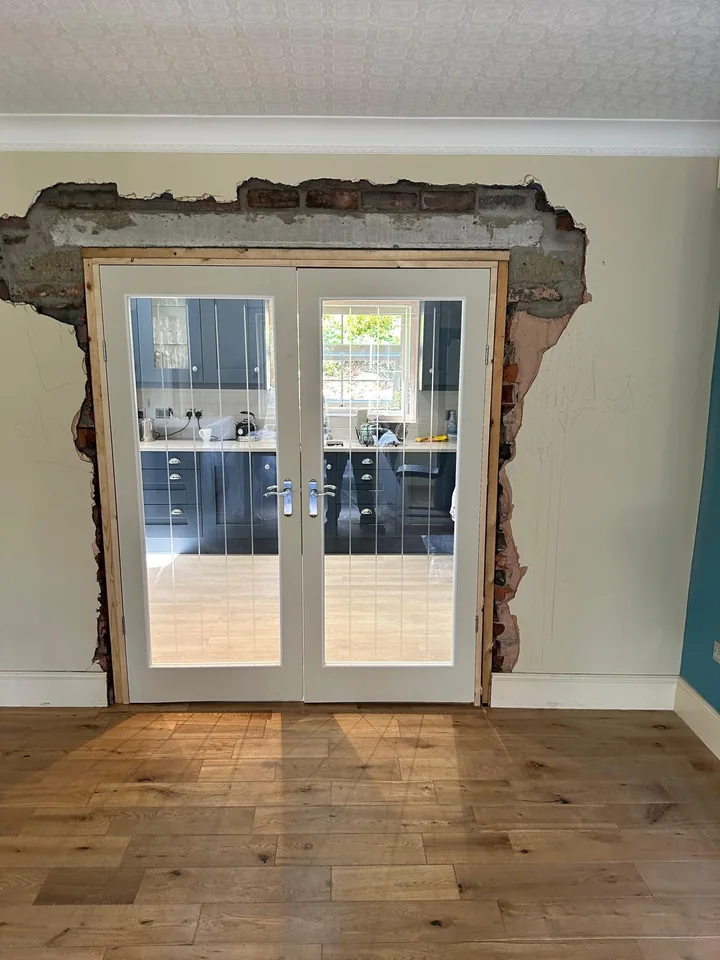 Glazed French doors fitted into a new opening